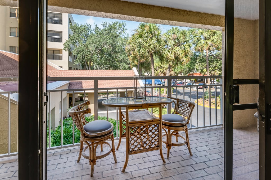 PRBelleairTowersL-12- Balcony In Our Caladesi Model - One-Bedroom Apartment Home